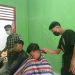 SMA Negeri 1 Kebun Tebu Gelar Pangkas Rambut Massal, Disiplinkan Siswa dan Dukung UMKM
