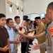 Perkuat Ekonomi Kerakyatan, Pemkab Tanggamus Serahkan AHU ke 20 Koperasi Desa Merah Putih