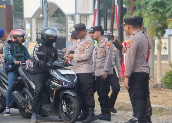 Semangat Kemerdekaan Menggema, Polres Lampung Selatan Bagikan 210 Bendera Merah Putih
